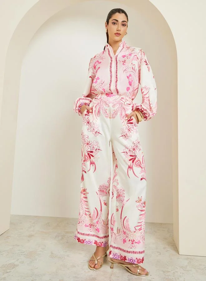 ستايلي بلوزة بطبعة زهور وأكمام منفوخة